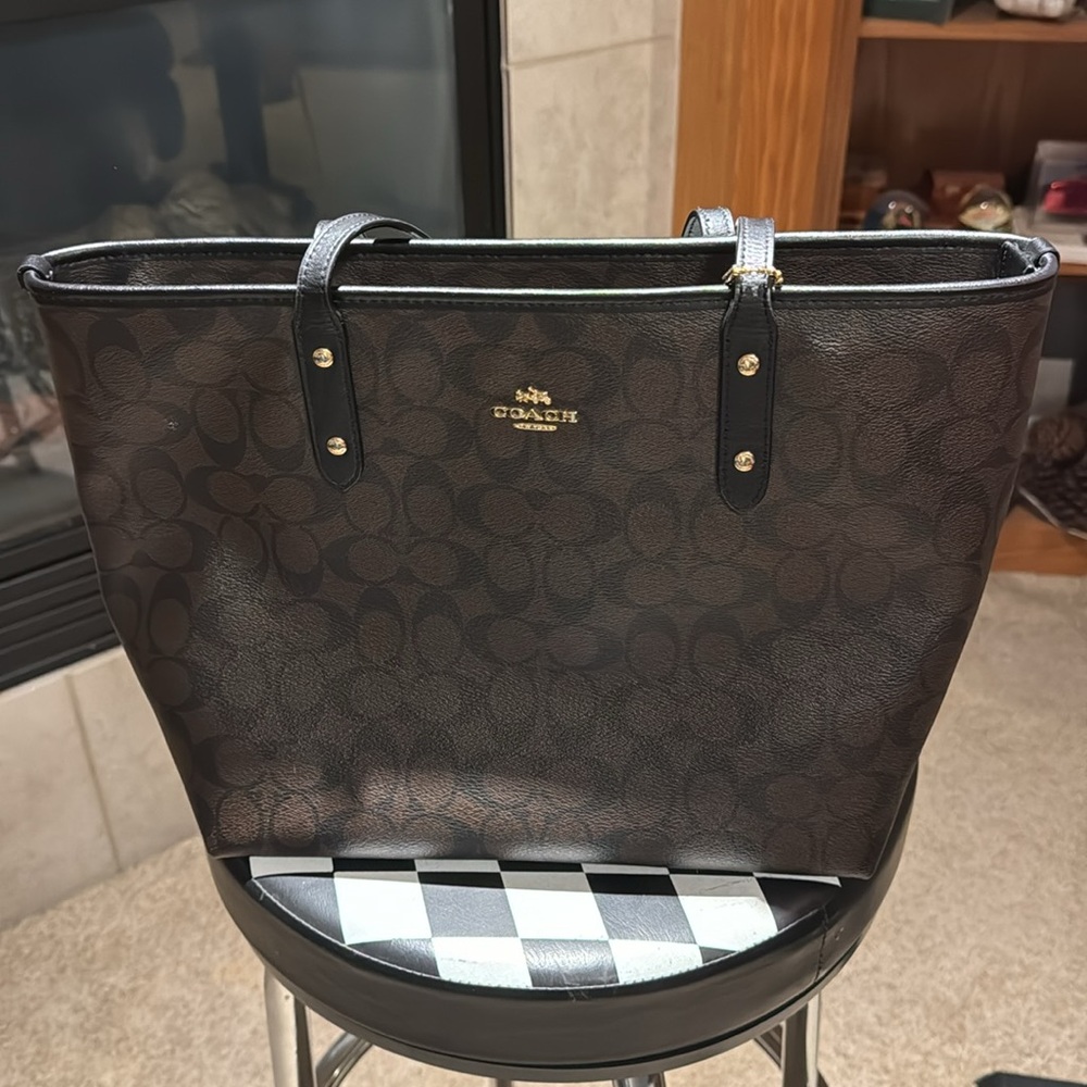Coach tote with matching wallets.
